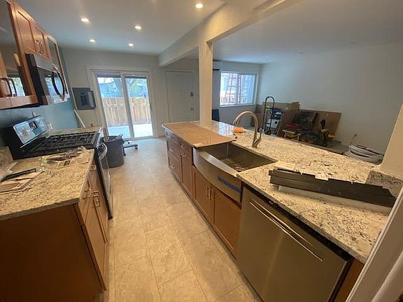 Fully remodeled kitchen with private east facing patio. New floors, new appliances and freshly painted. Half bath downstairs at bottom of stairs to the right.