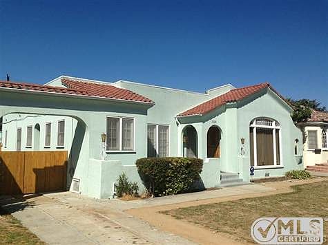 Front from drivewy, quaint well-preserved 1920s charmer; zoned for 2nd unit. 2-car Garage/shop at en