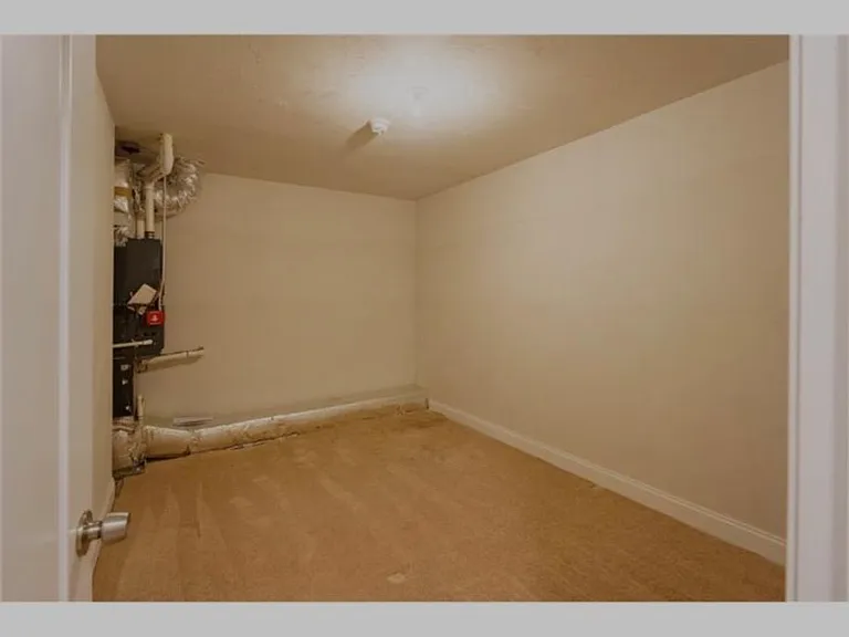 Upstairs storage room/AC room