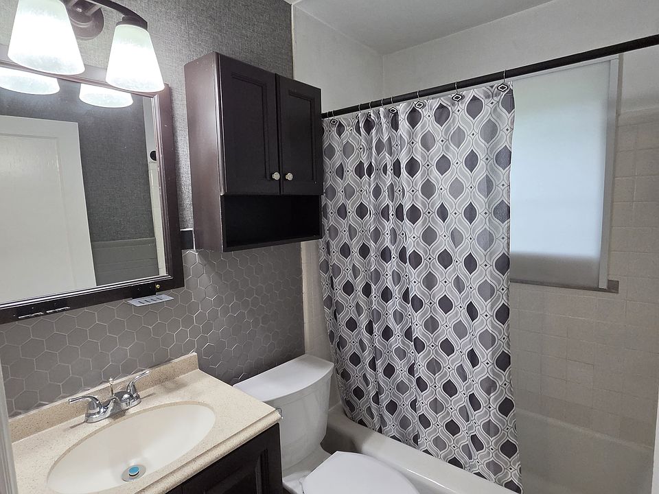 bath with new tile, paint and water closet