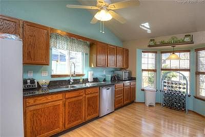 Spacious Kitchen with bay window and room for a breakfast or cafe table.