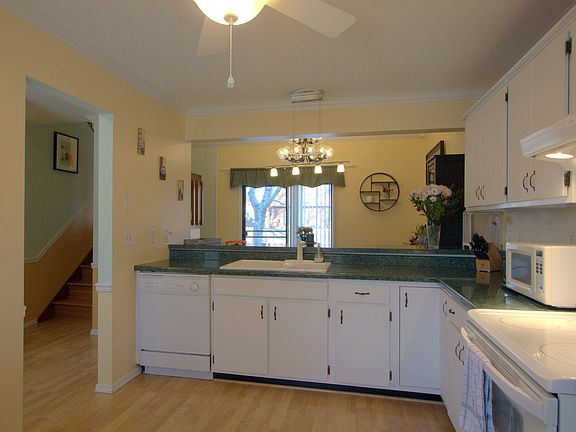 Kitchen opens to dining room