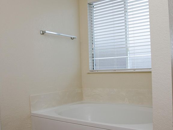 Master bedroom has a tub and also separate shower 