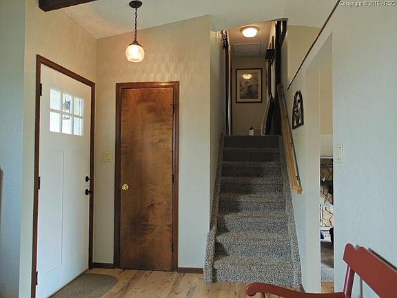 Gorgeous hardwood entrance with new door
