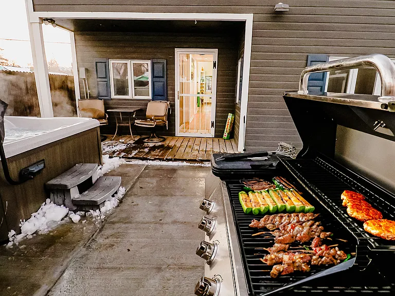 An outdoor setup with a BBQ grill, ready for grilling gourmet meals and hosting memorable gatherings with friends and family