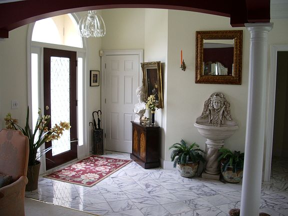 Marble entry with beveled entry door