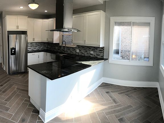 5th image of 8204 S Avalon Ave