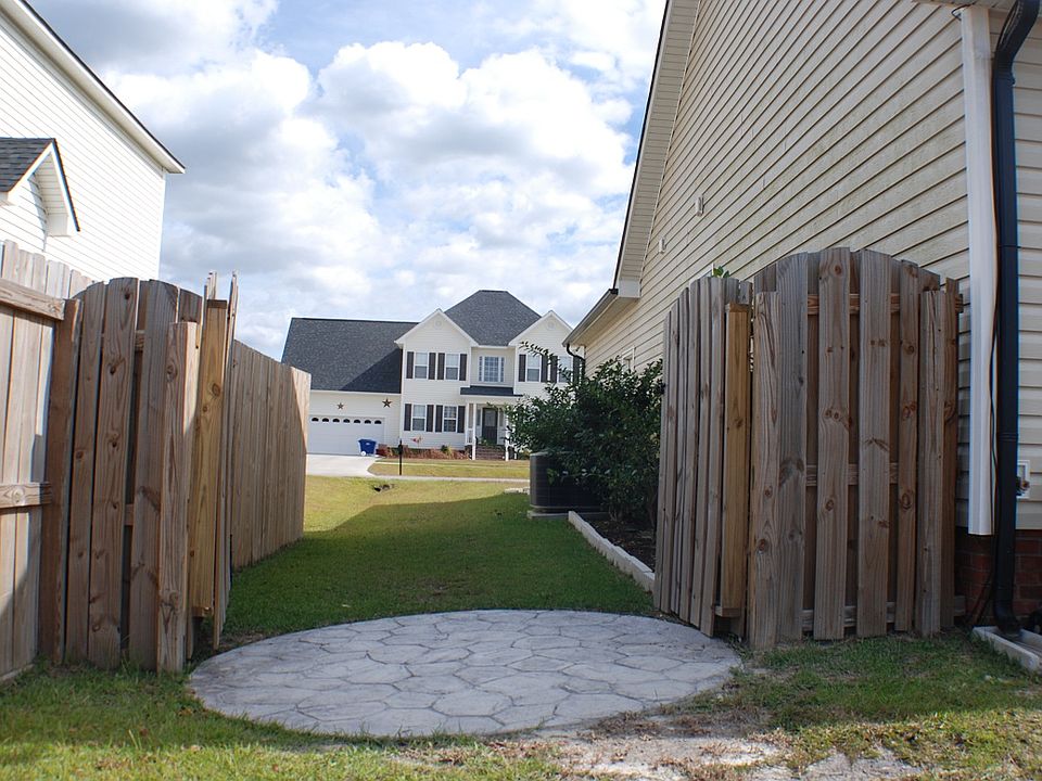 Scalloped fence/back yard