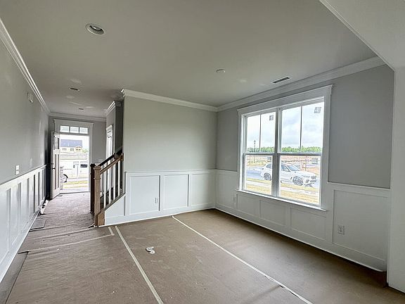 The main level view from the kitchen towards the front door of the Mason on Homesite 2286 at Wendell