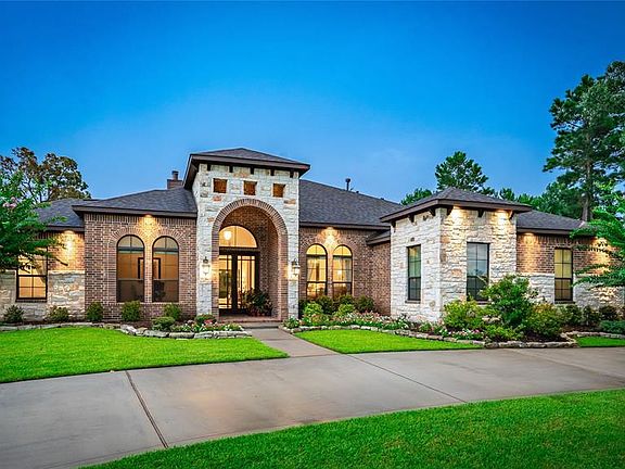 Impressive Curb Appeal with a sweeping circular drive.