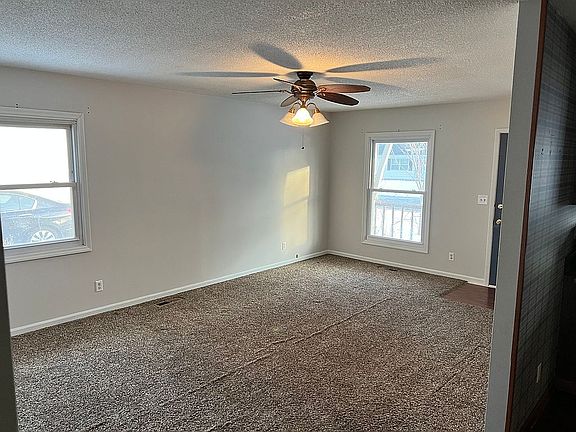 Living room with 2 windows