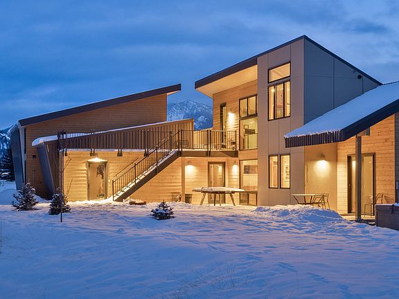 Master Suite & Hot Tub foreground. Guest House Background.