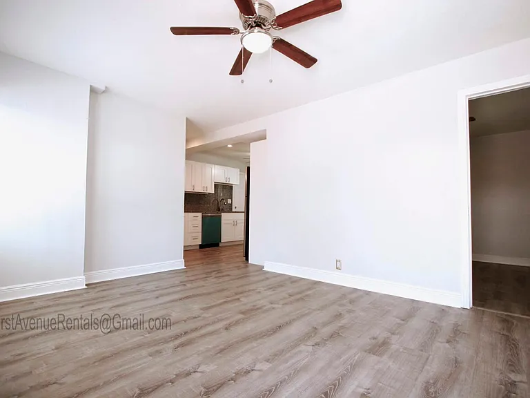 Lots of living space, interior view from front door looking in, bedroom on the right, kitchen in front
