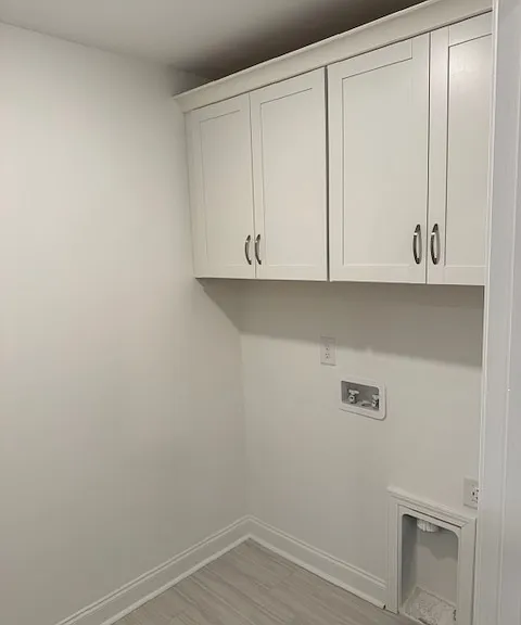 Laundry room. New front-load washer and dryer will be installed.