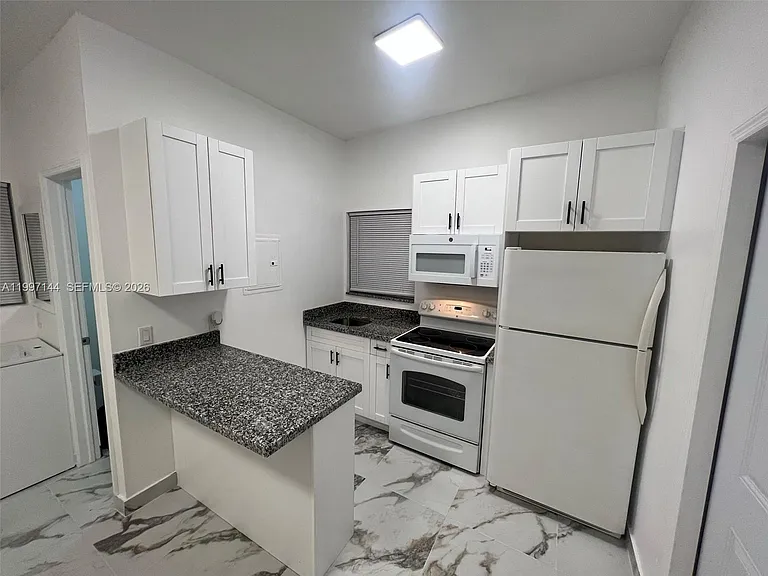 1720 NW 180th Ter #1 — Photo 6