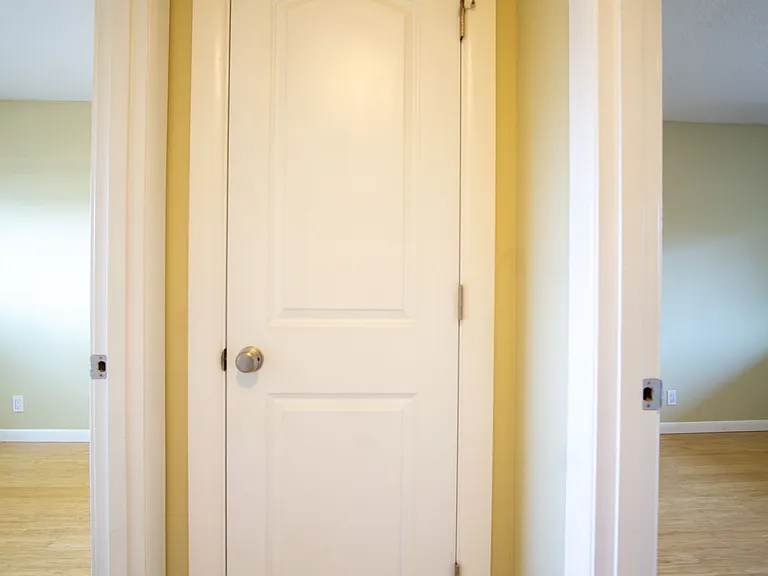 Get 1 Month FREE! Top-Floor 2-Bedroom with Bamboo Flooring + Off-Street Parking! — Photo 11