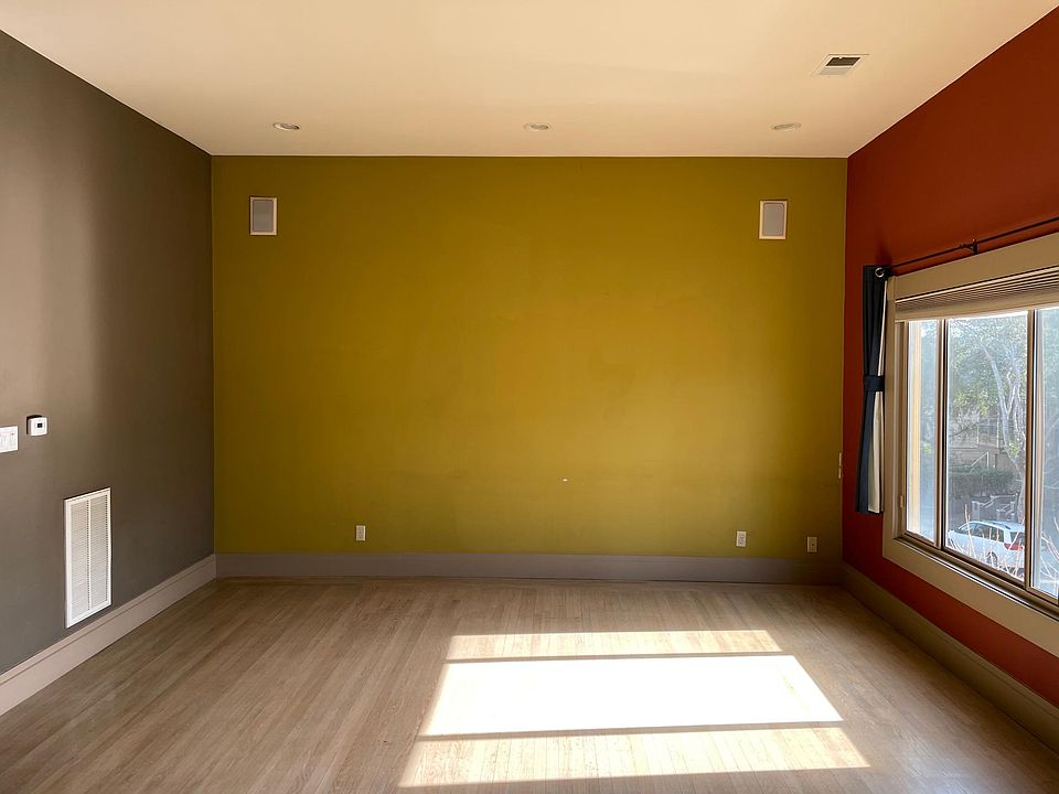 Lots of light from big insulated windows, carpet and hardwood floors