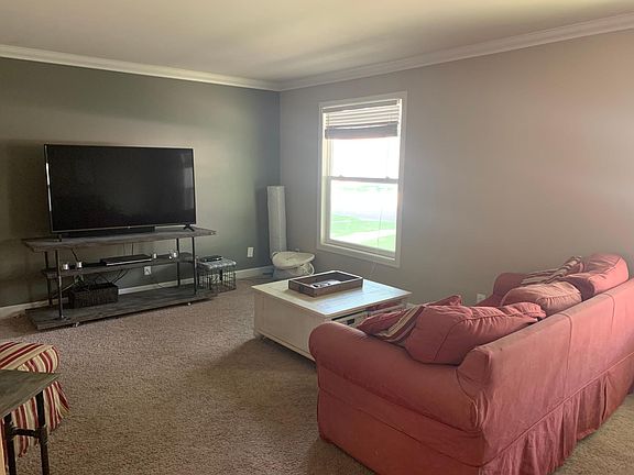 Living room right off the front door, to the right.