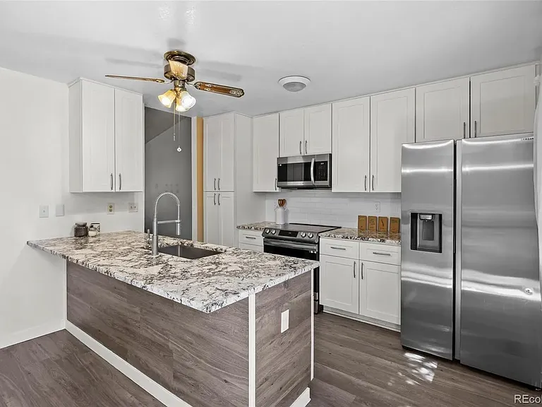 5626 S Odessa St — Photo 3