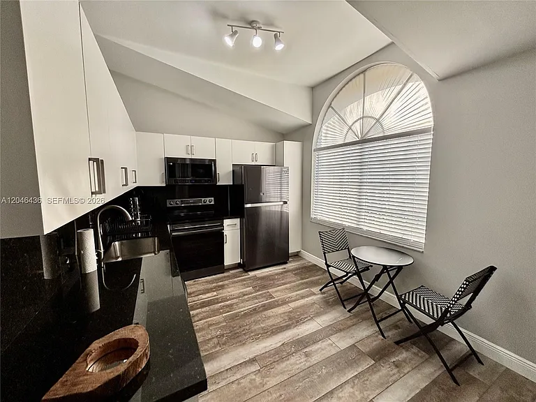 8769 SW 215th Ter #102 — Photo 2