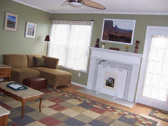 Den/living room, with gas logs fireplace (with custom cover)