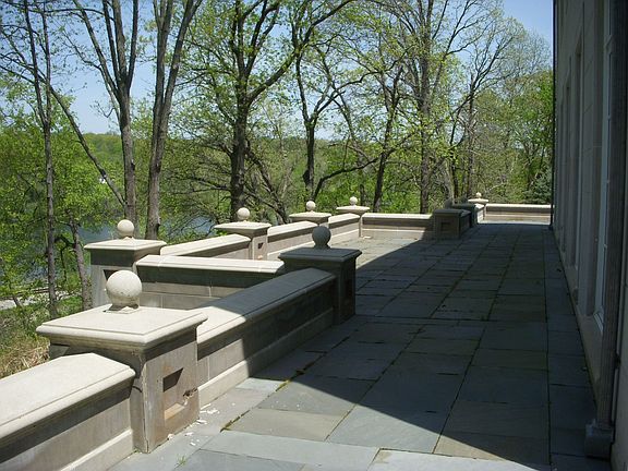 Bluestone patio overlooks river below