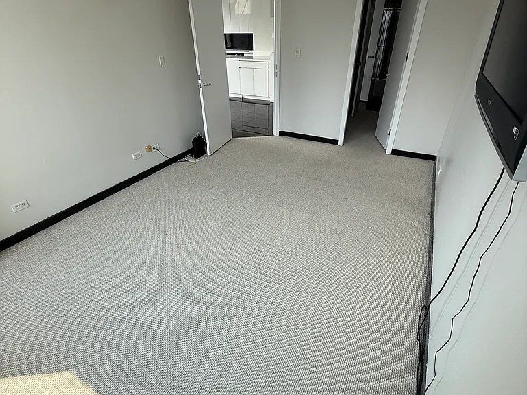 One bedroom looking towards the door.