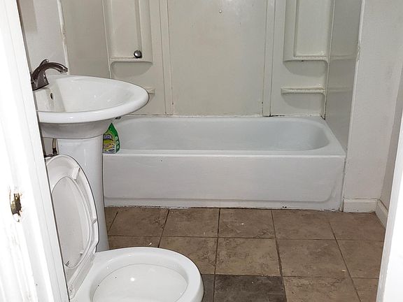 Bathroom next to living room