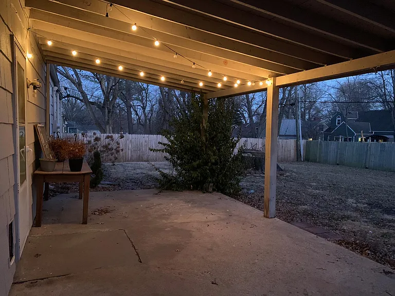 Covered back patio off the garage.