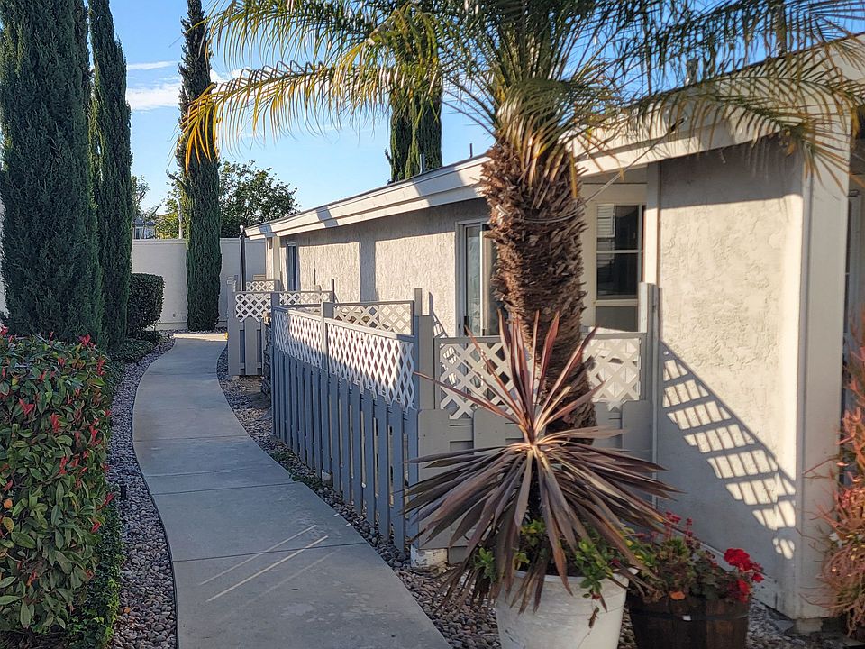 Wonderful landscaping between buildings and private patios at the Presidio Villa Apartments in Vista, California.