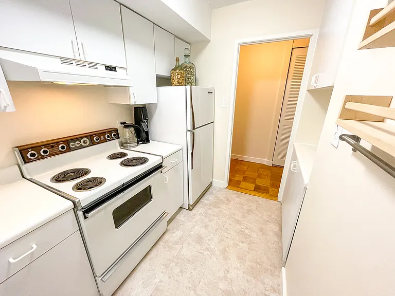 Kitchen looking towards entry hallway