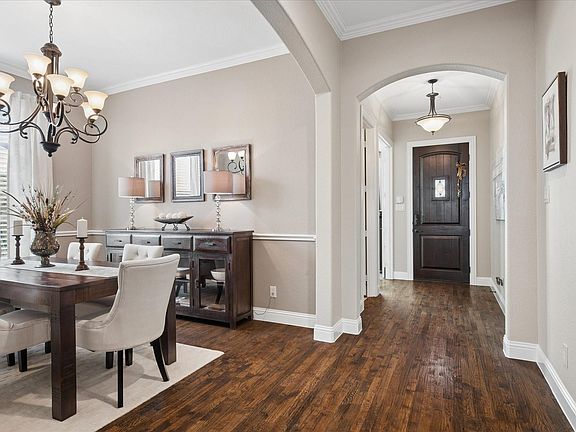  Inside, youll find carpet in the bedrooms, tile in wet areas, and hand-scraped hardwood flooring throughout the remaining living areas.