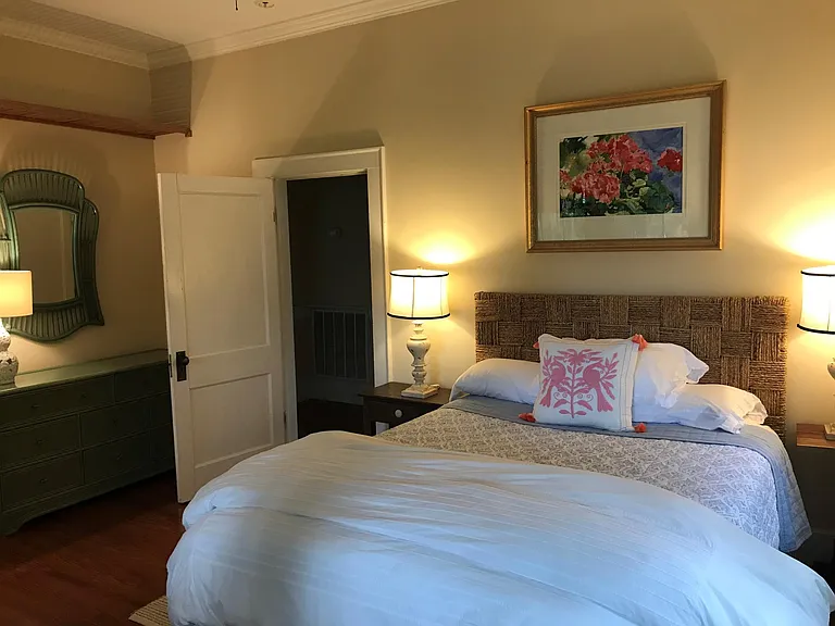 Bedroom with queen size bed overlooking the marsh
