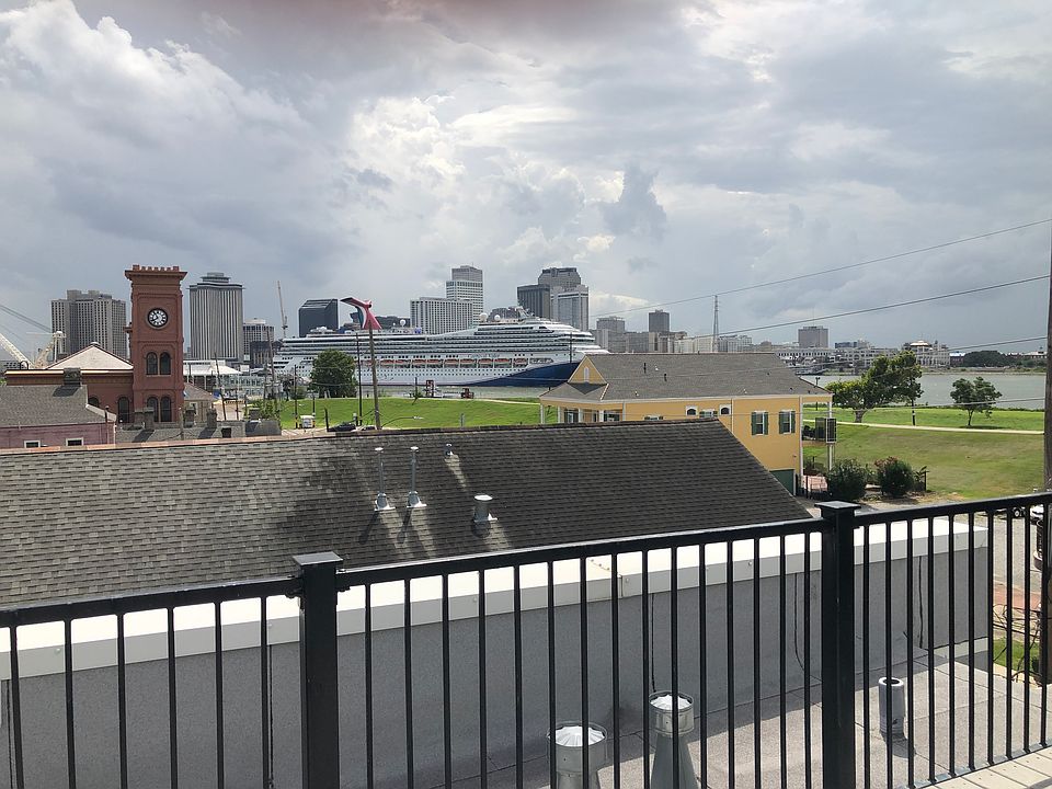 Spectacular views from your private roof top deck of Miss. River, downtown New Orleans.