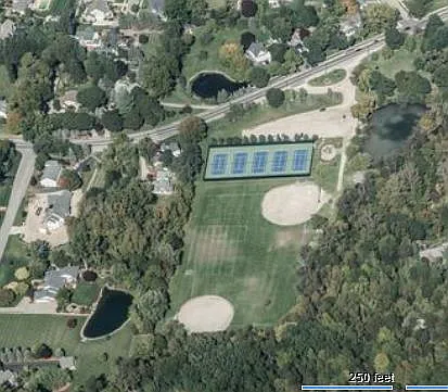 Home is left of tennis courts