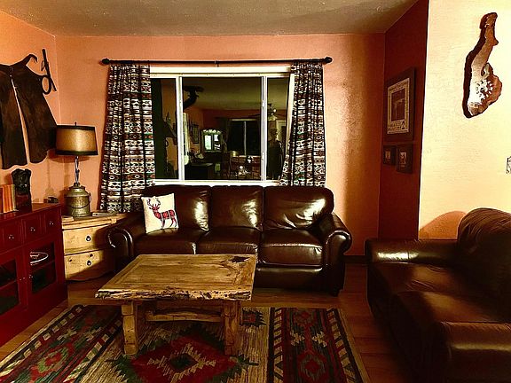 Living room. Wall decor will not be included.