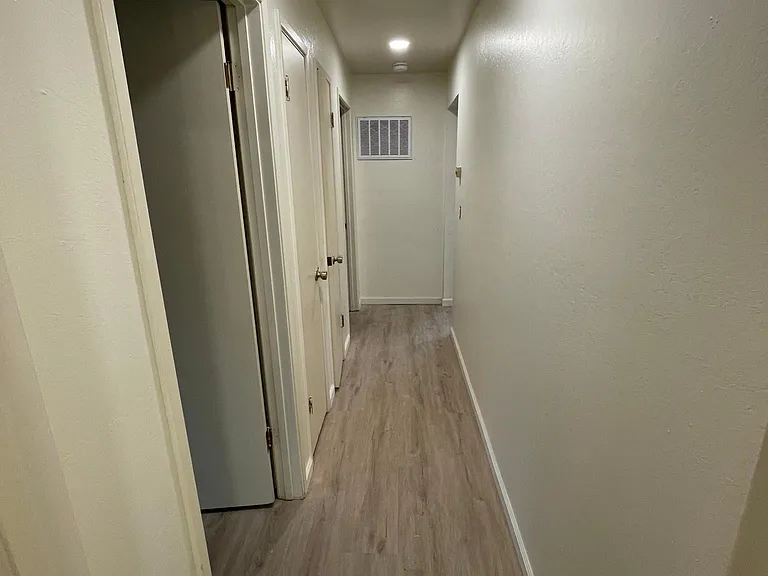 hallway with lots of closet space