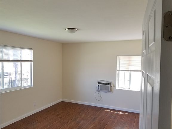 Open Living Room / Newer Laminate Flooring