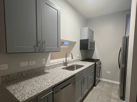 4th image of 2305 E 70th Pl APT 15