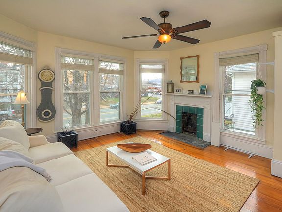 A sun-splashed, charming, and upscale living room to enjoy with friends.