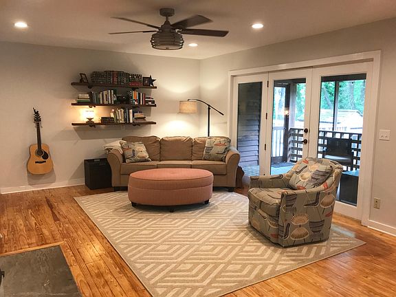 Spacious living room with wood stove