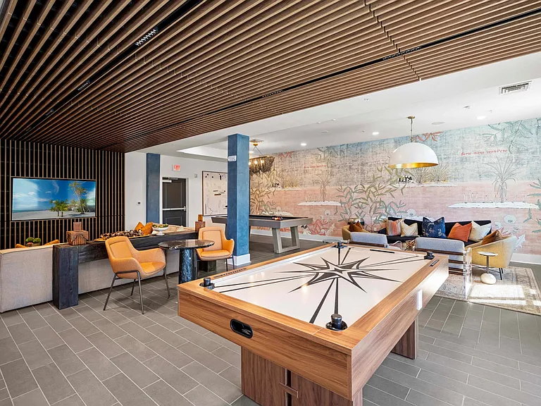 Resident Gaming Lounge with Air Hockey and Billiards Table