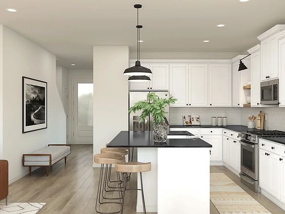 Kitchen with quartz countertops matte black hardware