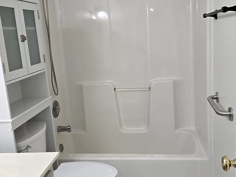 Hall bath with tiled floor