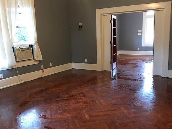 living area looking into master bedroom