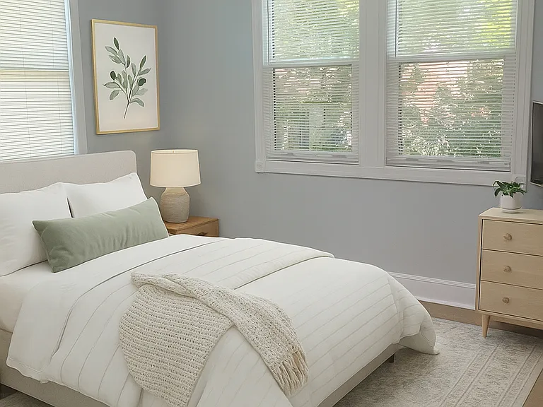 Digital rendering of the second bedroom on the right off the hallway.