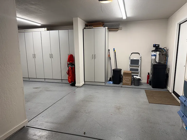 2 car garage with Cabinets, water softener system
