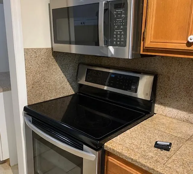 New Microwave just installed and the glass top stove.