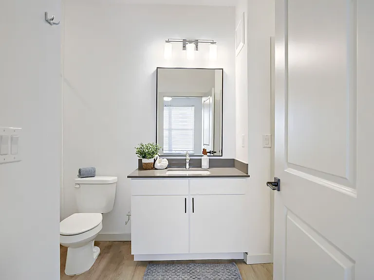 The BH-A1 bathroom features an entrance from the bedroom, as well as a door to the main living space.. Garrett Harvest Junction West, Longmont, CO. The BH-A1 bathroom features an entrance from the bedroom, as well as a door to the main living space.. Garr