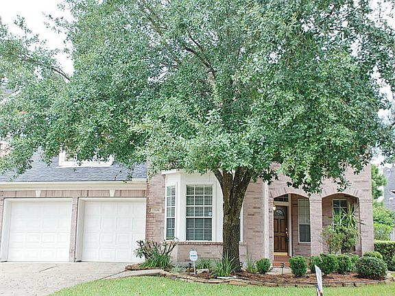 Double car garage has automatic door openers and plenty of storage.